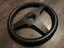 Load image into Gallery viewer, Abarth 315mm Black Leather Wheel
