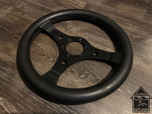 Load image into Gallery viewer, Raid 320mm Black Leather Wheel
