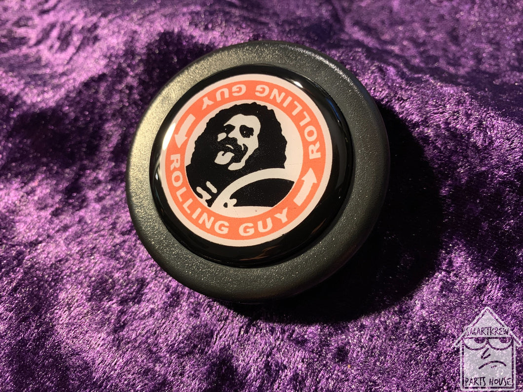 Handmade TXR0 Rolling Guy Horn Button